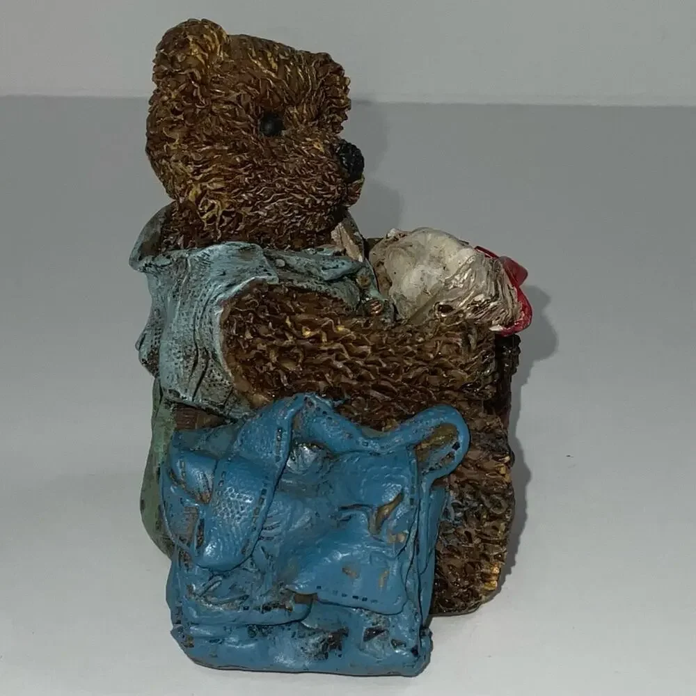 Cornerstone Creations collectible bear with book bag and reading a book.